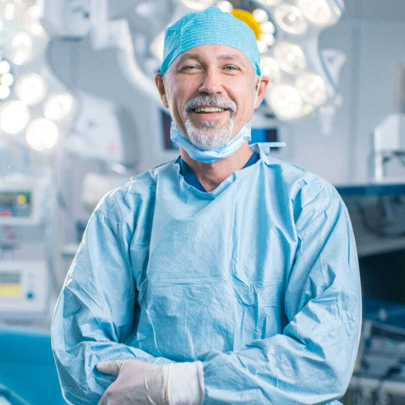 portrait,of,the,professional,surgeon,looking,into,camera,and,smiling